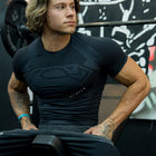 4117 - Superman Compression Tees - Sculpted fit, premium patterns, and detailed paneling, designed for performance and superhero-inspired style in Black.